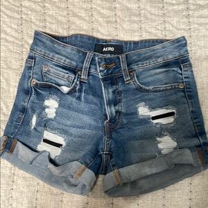 Blue Distressed Jean Shorts with Frayed Hem